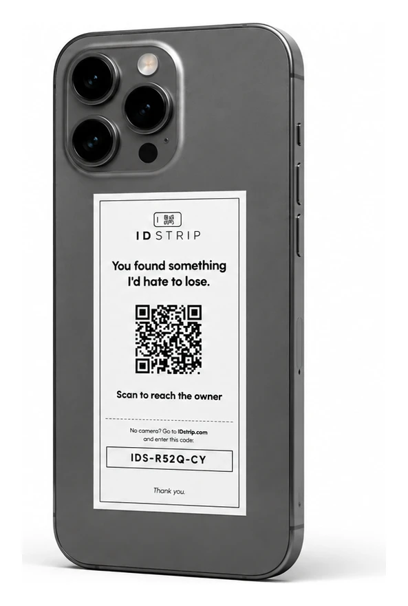 A phone with an IDstrip tag on the back — scan the QR code or enter the printed code to reach the owner